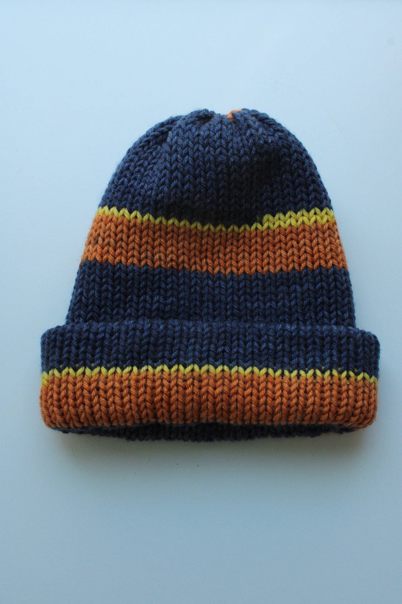 Handmade Knitted Winter Beanie – Cozy & Warm Striped Design